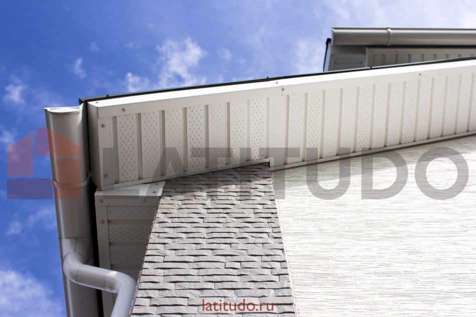 Отделка фасада дома японскими фиброцементными панелями KMEW