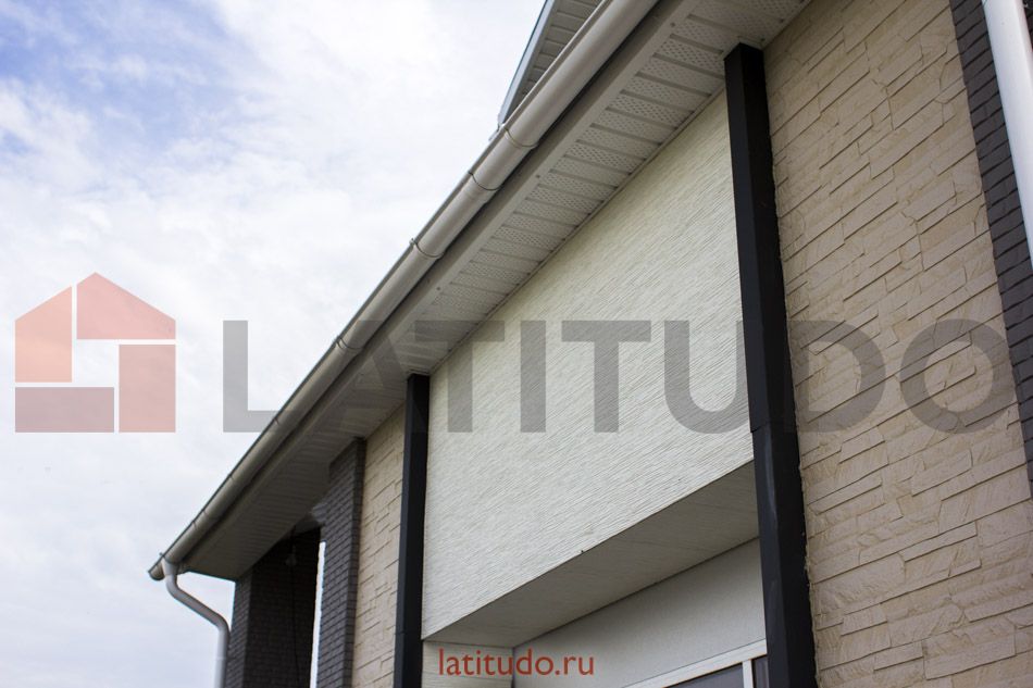 Отделка фасада дома японскими фиброцементными панелями KMEW | ЛАТИТУДО